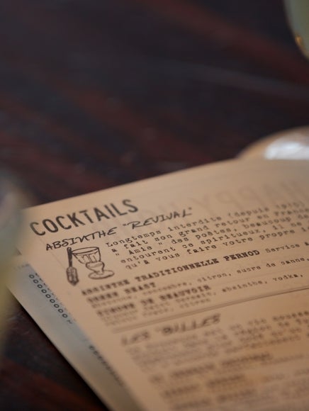 Cocktail menu at La Favorite in Paris showing absinthe inspired reciepes